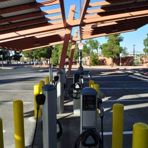 Government Center Photovoltaic 30kW photovoltaic-covering parking shade structure. Installation includes electric vehicle charging stations. ...