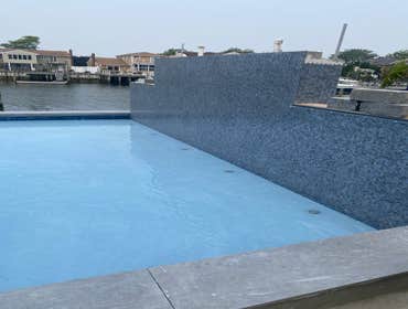 Wiring and Peripheral Grounding For Inground Pool We completed a full electrical installation for an inground pool in Bellmore. The customer requested 