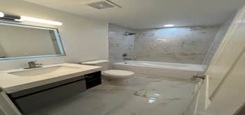 Photos by Goat Construction Group LLC #1 Bathroom replacement of floor/shower tile,
Floating vanity, add LED mirror, LED shower can light LED vanity li