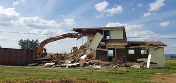 Demolition Examples of Demo projects. Houses were removed in order to build new homes. Barn was damaged by a fire.