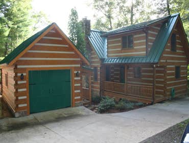 log house and garage