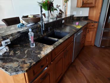 Photos by North Country Construction Inc #1 We built this gorgeous 5,000 SF house for a client in the powderhorn. It has a attached 3 car garage on a n