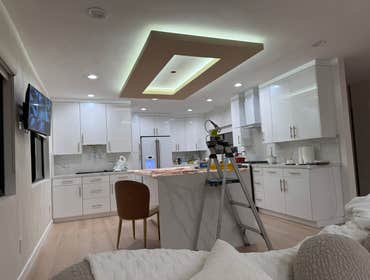 LED hanging ceiling fixture, including mounting hardware, electrical box preparation, wiring connections, and secure suspension