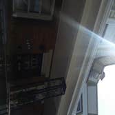 Front Porch, demo, framing, shingle roof, vinyl siding, gutters, drain