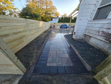 Photos by Rojas Landscaping & Handyman Services LLC #1 Preasure Threated Wood Horizontal Fence Installation
Exterior Fire Place
Paavers Patio/walkway