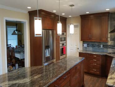 Hannum We did a new kitchen. Install new cabinets, tile flooring, granite counter tops, new appliances, new tile back splash, new powder room., new re