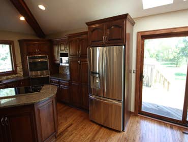 House Remodel in Corcoran Remodeled kitchen, two wet bars, bathroom, master bathroom, and sliding glass door.