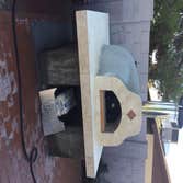 Pizza Oven Custom Pizza Oven with Trvertine prep area and wrap of opening with Rojo Alicante marble accent