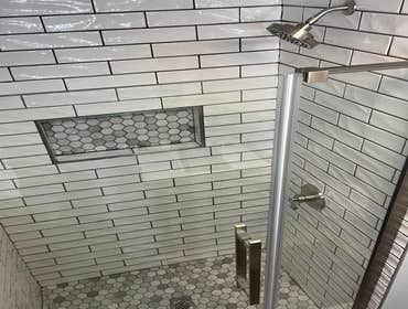 Photos by Desousa Construction and Remodeling #7 Remodeled bathroom