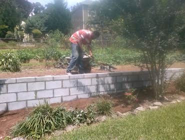 Project photos from Myers & Heard Masonry in Atlanta-Masonry Contractor Myers & Heard Masonry Contractors in Atlanta demolishing existing block retain