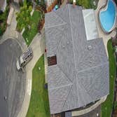 Photos by American Array Solar and Roofing #4 Sleek new roof in Pleasanton, CA using GAF Certified materials in Stone Grey - clean, modern, and built t