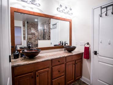 Custom Master Bathroom We updated this clients outdated master bathroom with strong, modern finishes.
