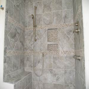 Total Bathroom Make Over Complete remodel down to the studs and sub-floor, with everything in the bath removed. Two layers of existing ceramic tile...