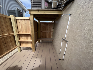 Photos by Mjf Carpentry LLC #1 Beautiful out door shower. All natural cedar walls, door and shelves with treated framing. Decking is Azak with a hidden