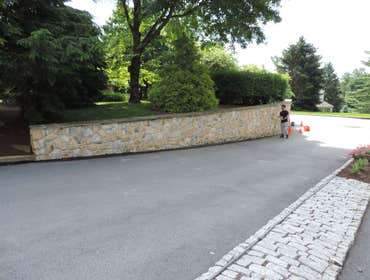 west chester stone walls These pictures are of two entry walls leading into a community that we preformed top to bottom restoration on. Loose and broke