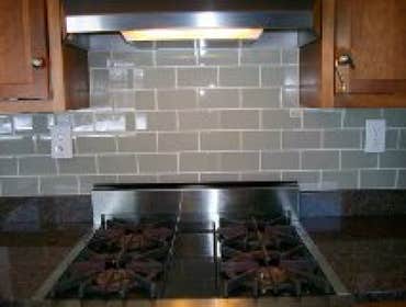 Glass tile backsplash we gave a tiny kitchen some big style
