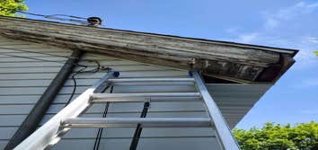 Photos by Ground Up Home Improvements #2 We wrapped everything with an alumium soffit and facia with A-1 seamless gutters, Tucking metal on old wood ke