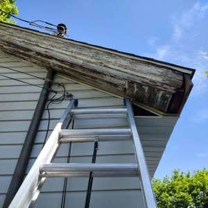 Photos by Ground Up Home Improvements #2 We wrapped everything with an alumium soffit and facia with A-1 seamless gutters, Tucking metal on old...
