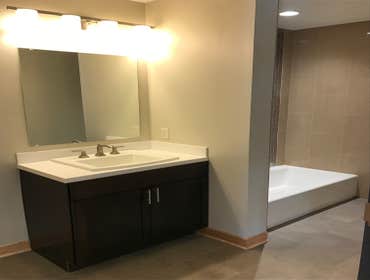 Photos from TGC Remodeling Pool room convert to three one bedroom apartments. Job - convert former pool room in basement of apartment building to three