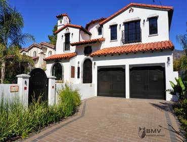 Mission Design New custom Home in Pasadena Mission Design custom home, dark bamboo flooring and marble foyer and bathroom's flooring, custom/built-in c