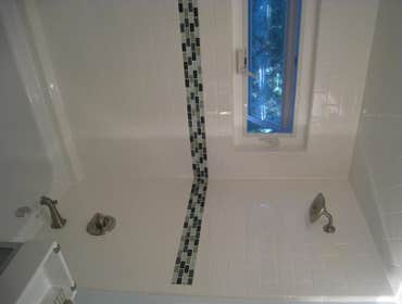 Tile Shower This project was a total shower re-build, with Hardi-Backer, Red-Guard, Subway tile and a Mosaic accent.