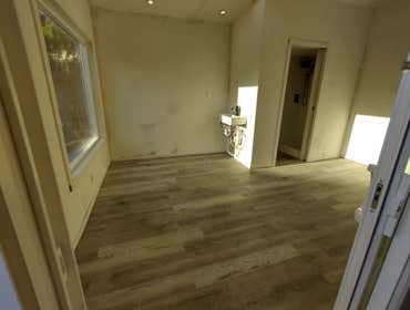 Photos by Stewart & Son Gate & Fence LLC #1 Tiny House with pergola. Small house 17' by 12' small bathroom with pocket door, and small sink with water 