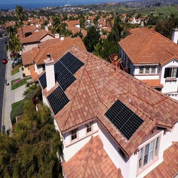 Photos by Trmj Roofing Inc Solar Panal Inserts on comp shingle with tile picture frame