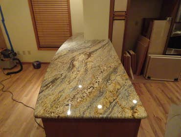 Kitchen Remodel 1 Take a look at the fabrication of this beautiful granite. Heat coils were installed under the bar to keep it comfortably warm.