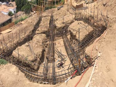 Mount Washinton Hillside land development including caissons/piles, grade beams, CMU block walls, retaining walls. All known as foundation and structur