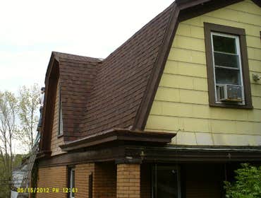 This is a panoramic display of a variety of photos from numerous jobs. We are showing everything from a flat membrane roof to box gutter and chimney re