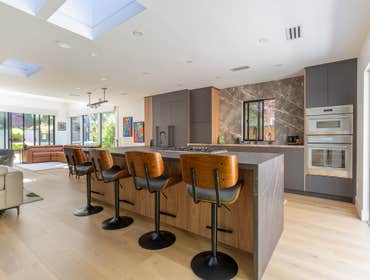 San Bruno Addition and Remodel Large rear addition to accommodate a new master suite, office, family room, vaulted ceilings, 19 skylights, reconfigured