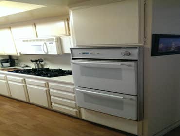 Becerra Kitchen Paint & Kitchen remodel While using existing Corain counter tops.