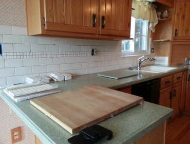 DiBiase Tile Backsplash This was a remove old tile, repair drywall waterproof and install new subway tile..