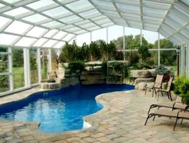 Retractable Pool Enclosure - Covers in Play Inc.