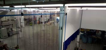 Curtain Wall Installation Commercial Curtain wall installation to help reduce sound from new equipment