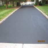Project photos from Back To Black Sealcoating LLC The First picture is a driveway that was done 3 days prior to taking the picture.. The second picture