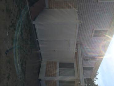 New outside shower enclosure in yarmouth New outside shower enclosure 5’x13’ built with in ground drainage, composite decking floor and floating bench 