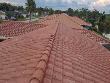 Photos by Progressive Remodeling and Roofing - #3 Full tile re-roof replacement