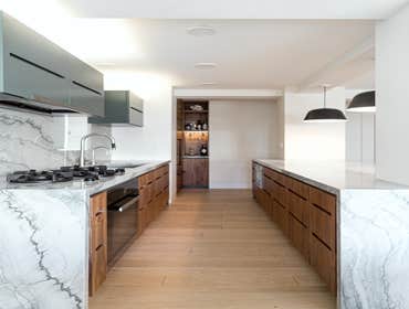 UES Two Bedroom Renovation Gut renovation of a 1,100 SF two-bedroom, two-bathroom cooperative in Manhattan with custom designed moldings, doors and mil