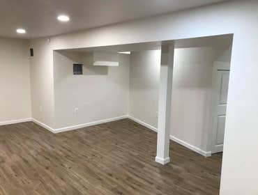After photo of Walkout Basement with LVT Flooring