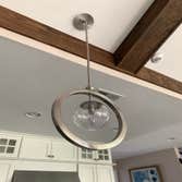 Fan Install- Modern New Construction Homes Installation of a non-standard fan in a new construction home. Installation of light fixtures.