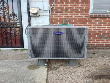 Photos by Al Group LLC #2 The new indoor coil and outdoor Carrier condencer have been added.