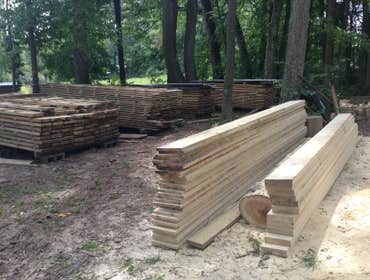Sawmill and custom wood Sawmill owned and operated by Murphy Construction Design. Custom cut wood to clients specifications.