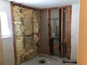 Photos by Griffin Tile & Marble Co #1 Master bath remodel. Remove PVC shower insert , remove separating wall , install new tile shower matching the til