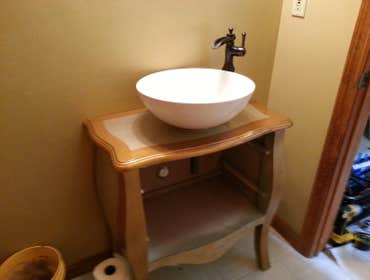 John Powers Plumbing Project Powder room custom vanity. Replaced a basic Pedestal sink.