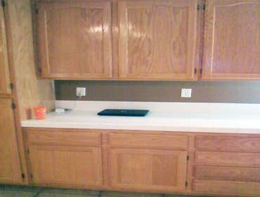Jaramillo Kitchen Renovation We took an ordinary home builders stock kitchen in Palmdale, Ca. and gave it a makeover. First the existing white ceramic