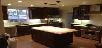 Trusted Respected Unique Construction Inc Project Before and after photos of a kitchen remodel