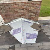 Photos by Alpine Construction #2 Cricket built to stop lifelong leak at the chimney
