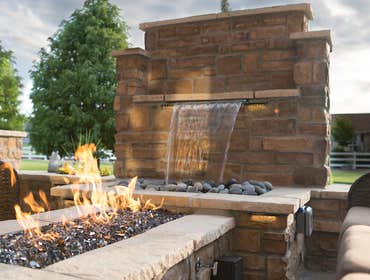 Firepits We all enjoy sitting around a camp fire. You can enjoy this experience year round with a fully installed custom fire pit and outdoor living sp