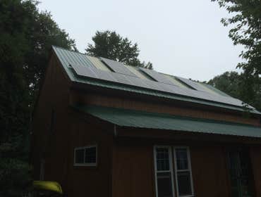 Photos by Plymouth Solar Energy #1 Ground Mounted hillside array